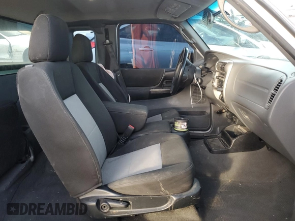 2010 Ford Ranger XLT with VIN 1FTLR4FEXAPA77819, listed as a Copart auction lot 84860944 with 179,627 mi miles and Salvage title. Bid and sale history available at DreamBid. Image 7.
