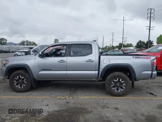 2021 Toyota Tacoma SR z VIN 3TMCZ5AN3MM374132, wystawiony jako IAAI lot #42068562 z przebiegiem 38 654 mil mil oraz . Historia ofert i sprzedaży dostępna na DreamBid. Obrazek 15.