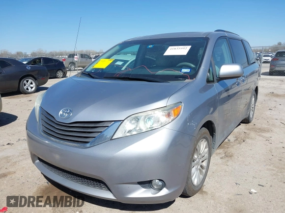 2011 Toyota Sienna XLE AAS with VIN 5TDYK3DCXBS172586, listed as a IAAI auction lot 41835992 with 203,599 mi miles. Bid and sale history available at carsss.com. Image 17.