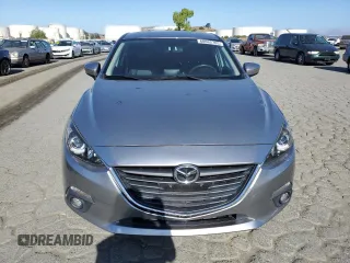 2015 Mazda 3 i Grand Touring z VIN JM1BM1M70F1260802, wystawiony jako Copart lot #60662705 z przebiegiem 89 974 mil mil oraz Szkoda całkowita • Salvage title. Historia ofert i sprzedaży dostępna na DreamBid. Obrazek 5.