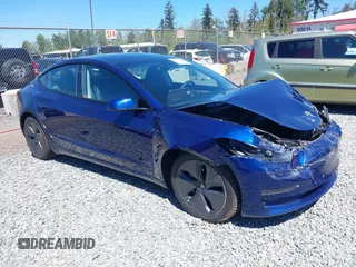 2023 Tesla Model 3 z VIN 5YJ3E1EA9PF639141, wystawiony jako IAAI lot #42167773 z przebiegiem 57 459 mil mil oraz . Historia ofert i sprzedaży dostępna na DreamBid. Obrazek 1.