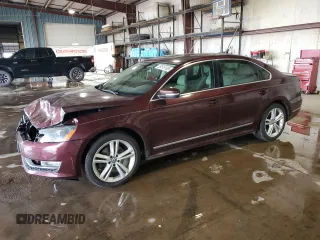2014 Volkswagen Passat SEL Premium with VIN 1VWCN7A32EC078363, listed as a Copart auction lot 59516105 with 75,329 mi miles and Salvage title. Bid and sale history available at DreamBid. Image 1.