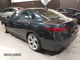 2021 Alfa Romeo Giulia Ti z VIN ZARFANBN7M7644482, wystawiony jako IAAI lot #42502199 z przebiegiem 27 962 mil mil oraz . Historia ofert i sprzedaży dostępna na DreamBid. Obrazek 3.