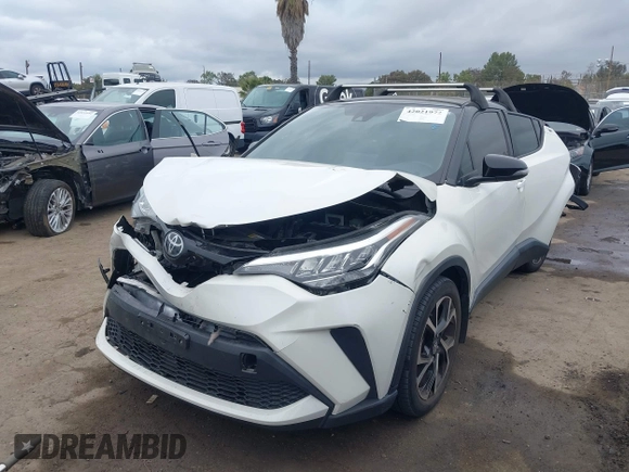 2020 Toyota C-HR LE with VIN JTNKHMBX9L1092934, listed as a IAAI auction lot 42021972 with 56,777 mi miles and . Bid and sale history available at DreamBid. Image 17.