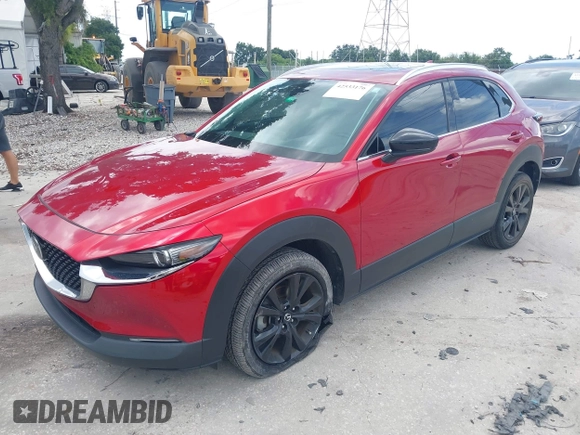 2023 Mazda CX-30 Premium с VIN 3MVDMBDY3PM507398, выставлен на аукционе IAAI как лот 42533176 с пробегом 15 788 миль миль и . История ставок и продаж доступна на DreamBid. Изображение 2.