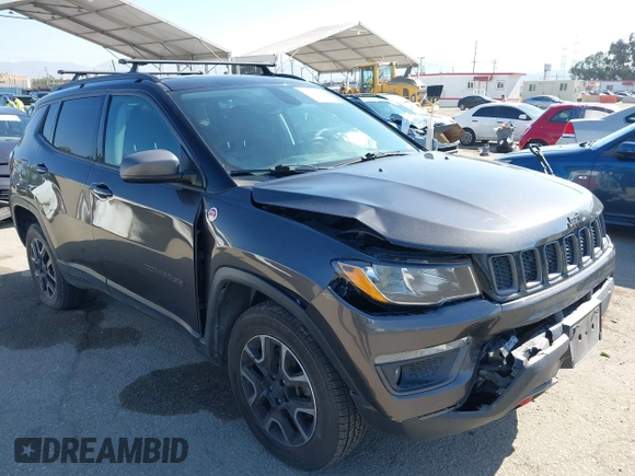 2019 Jeep Compass Trailhawk with VIN 3C4NJDDB3KT759849, listed as a IAAI auction lot 42141467 with 100,915 mi miles and . Bid and sale history available at DreamBid. Image 1.