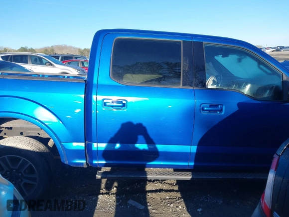 2015 Ford F-150 XL with VIN 1FTEW1CF4FFB55487, listed as a IAAI auction lot 41867754 with 213,454 mi miles. Bid and sale history available at carsss.com. Image 14.