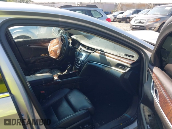 2013 Cadillac XTS Luxury z VIN 2G61R5S38D9228339, wystawiony jako IAAI lot #42664948 z przebiegiem 105 917 mil mil oraz . Historia ofert i sprzedaży dostępna na DreamBid. Obrazek 5.