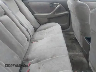 1997 Toyota Camry LE z VIN 4T1BG22K9VU786181, wystawiony jako IAAI lot #41610928 z przebiegiem 338 829 mil mil oraz . Historia ofert i sprzedaży dostępna na DreamBid. Obrazek 8.