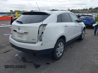 2016 Cadillac SRX Luxury Collection z VIN 3GYFNBE33GS507014, wystawiony jako IAAI lot #41979980 z przebiegiem 115 077 mil mil oraz . Historia ofert i sprzedaży dostępna na DreamBid. Obrazek 4.