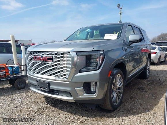 2023 GMC Yukon Denali with VIN 1GKS2DKL6PR231948, listed as a IAAI auction lot 41586428 with 69,458 mi miles. Bid and sale history available at carsss.com. Image 2.