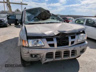 2004 Isuzu Rodeo S with VIN 4S2DM58W144316571, listed as a Copart auction lot 72086554 with Not Provided miles and Salvage Title. Bid and sale history available at DreamBid. Image 12.