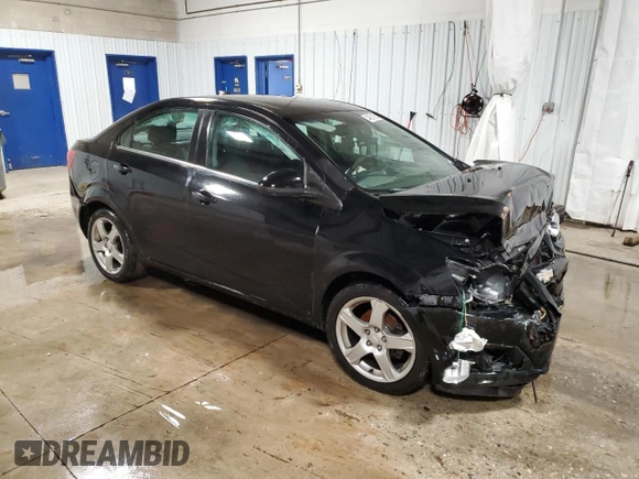2012 Chevrolet Sonic LT z VIN 1G1JC5SHXC4142552, wystawiony jako Copart lot #44557255 z przebiegiem 135 871 mil mil oraz Szkoda całkowita • Salvage title. Historia ofert i sprzedaży dostępna na DreamBid. Obrazek 4.