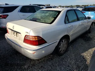 2000 Acura RL with VIN JH4KA9654YC000685, listed as a Copart auction lot 73986054 with 0 mi miles and Salvage Title. Bid and sale history available at carsss.com. Image 3.