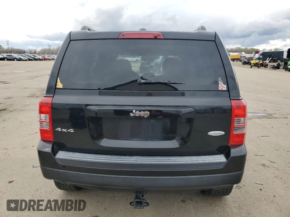 2014 Jeep Patriot Latitude with VIN 1C4NJRFB4ED689363, listed as a Copart auction lot 51185125 with 132,340 mi miles and Salvage Title. Bid and sale history available at carsss.com. Image 6.
