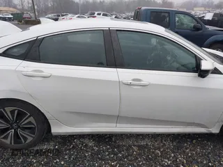 2017 Honda Civic Sedan EX-L with VIN 2HGFC1F74HH648624, listed as a IAAI auction lot 41556540 with 79,147 mi miles. Bid and sale history available at carsss.com. Image 14.
