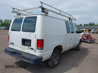2013 Ford Econoline Cargo Commercial with VIN 1FTNE2EW8DDB33894, listed as a IAAI auction lot 42841415 with 224,026 mi miles and . Bid and sale history available at DreamBid. Image 4.