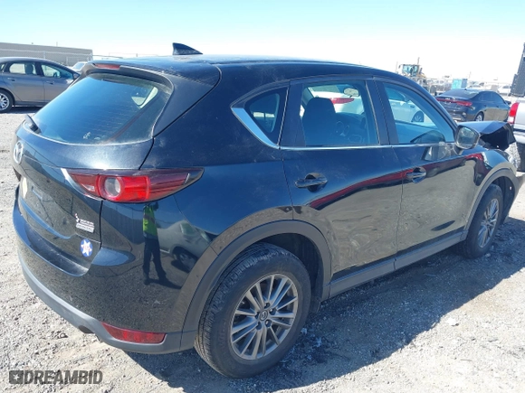 2017 Mazda CX-5 Sport with VIN JM3KFBBL2H0144792, listed as a IAAI auction lot 41654031 with 77,107 mi miles. Bid and sale history available at carsss.com. Image 4.