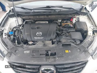 2016 Mazda CX-5 Grand Touring z VIN JM3KE2DY8G0885006, wystawiony jako IAAI lot #41615873 z przebiegiem 118 890 mil mil oraz . Historia ofert i sprzedaży dostępna na DreamBid. Obrazek 10.