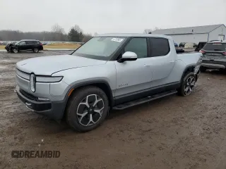 2024 Rivian R1T Adventure with VIN 7FCTGBAA2RN030445, listed as a Copart auction lot 44703985 with 16,183 mi miles and Salvage Title. Bid and sale history available at carsss.com. Image 1.