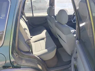 2002 Kia Sportage with VIN KNDJA723425144951, listed as a IAAI auction lot 42049262 with 149,793 mi miles. Bid and sale history available at carsss.com. Image 8.