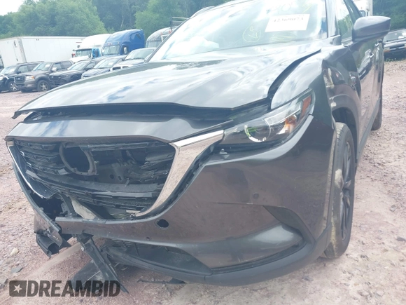 2022 Mazda CX-9 Touring Plus with VIN JM3TCBAY2N0611876, listed as a IAAI auction lot 42369073 with 37,639 mi miles and . Bid and sale history available at DreamBid. Image 6.