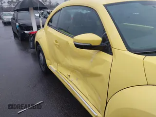 2013 Volkswagen Beetle 2.5L with VIN 3VWHX7AT7DM613197, listed as a IAAI auction lot 41298890 with 130,219 mi miles and . Bid and sale history available at DreamBid. Image 17.