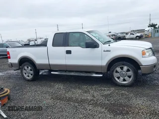 2006 Ford F-150 XLT with VIN 1FTPX14596NA27117, listed as a IAAI auction lot 41589818 with 166,727 mi miles. Bid and sale history available at carsss.com. Image 13.
