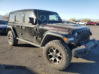 2021 Jeep Wrangler Unlimited Rubicon with VIN 1C4HJXFN4MW517400, listed as a Copart auction lot 44439525 with 31,874 mi miles and Salvage Title. Bid and sale history available at DreamBid. Image 4.