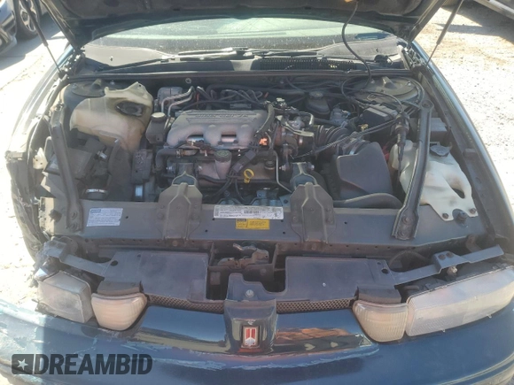1997 Oldsmobile Cutlass Supreme S z VIN 1G3WH52M7VF349340, wystawiony jako Copart lot #50806565 z przebiegiem 1 254 585 mil mil oraz Szkody całkowita. Historia ofert i sprzedaży dostępna na DreamBid. Obrazek 11.