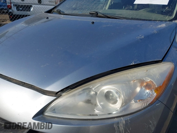 2012 Mazda 5 Sport with VIN JM1CW2BL1C0115788, listed as a IAAI auction lot 41770484 with 154,182 mi miles. Bid and sale history available at carsss.com. Image 6.
