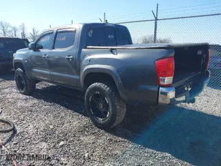 2016 Toyota Tacoma SR with VIN 3TMCZ5AN0GM015471, listed as a IAAI auction lot 41660876 with 81,031 mi miles. Bid and sale history available at carsss.com. Image 3.