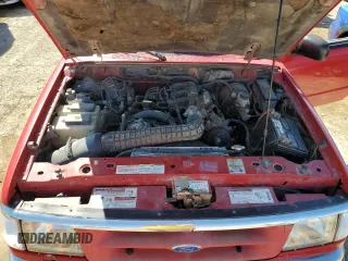 1997 Ford Ranger XLT with VIN 1FTCR11X1VTA20882, listed as a Copart auction lot 70052614 with 211,824 mi miles and Salvage title. Bid and sale history available at DreamBid. Image 12.