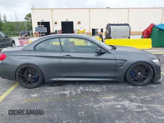 2016 BMW M4 with VIN WBS3U9C51GP968602, listed as a IAAI auction lot 42442452 with 3 mi miles and . Bid and sale history available at DreamBid. Image 13.