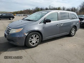 2012 Honda Odyssey EX-L with VIN 5FNRL5H68CB105623, listed as a Copart auction lot 55166905 with 147,417 mi miles and Salvage Title. Bid and sale history available at carsss.com. Image 1.