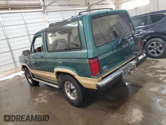 1987 Ford Bronco z VIN 1FMCU14T8HUA51662, wystawiony jako Copart lot #74972024 z przebiegiem 26 362 mil mil oraz Szkoda całkowita • Salvage title. Historia ofert i sprzedaży dostępna na DreamBid. Obrazek 2.