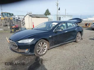 2014 Tesla Model S 60 with VIN 5YJSA1H12EFP53787, listed as a IAAI auction lot 42279493 with 168,859 mi miles and . Bid and sale history available at DreamBid. Image 17.