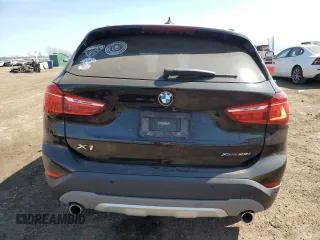 2019 BMW X1 xDrive28i with VIN WBXHT3C59K5L90348, listed as a Copart auction lot 48406515 with 66,292 mi miles and Salvage Title. Bid and sale history available at carsss.com. Image 6.