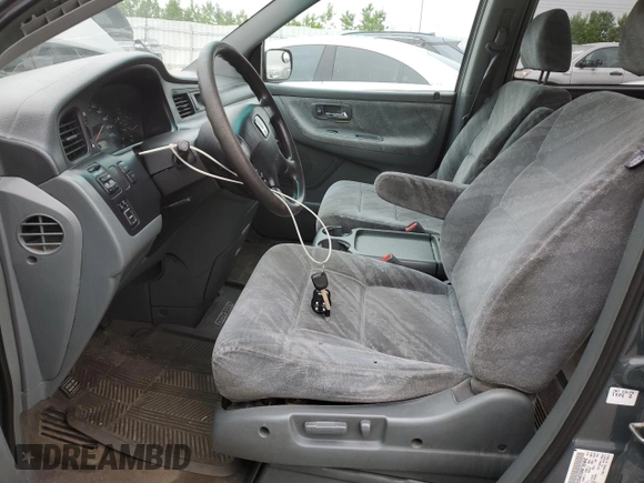 2003 Honda Odyssey EX with VIN 2HKRL18603H008412, listed as a Copart auction lot 87502365 with 352,773 mi miles and Salvage Title. Bid and sale history available at DreamBid. Image 7.