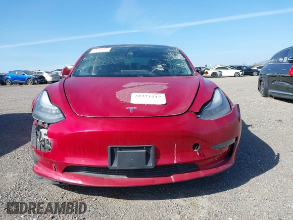 2020 Tesla Model 3 Standard Range Plus with VIN 5YJ3E1EA7LF706636, listed as a IAAI auction lot 32371217 with 35,389 mi miles. Bid and sale history available at carsss.com. Image 12.