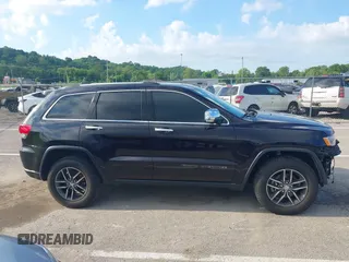 2018 Jeep Grand Cherokee Limited with VIN 1C4RJFBG4JC433449, listed as a IAAI auction lot 42219850 with 111,961 mi miles and . Bid and sale history available at DreamBid. Image 14.