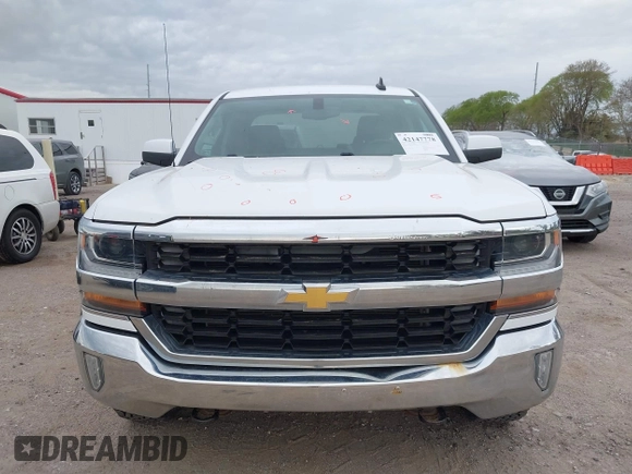 2016 Chevrolet Silverado 1500 LT with VIN 1GCVKREC7GZ338959, listed as a IAAI auction lot 42147778 with 140,570 mi miles and . Bid and sale history available at DreamBid. Image 12.