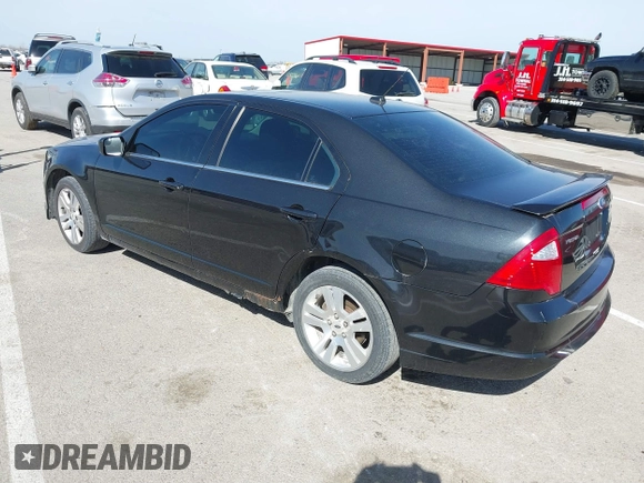2011 Ford Fusion SE with VIN 3FAHP0HA8BR232236, listed as a IAAI auction lot 41819322 with 196,339 mi miles. Bid and sale history available at carsss.com. Image 3.