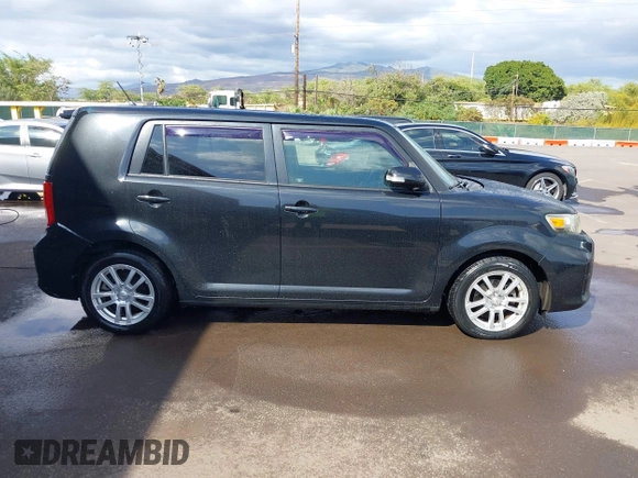 2014 Scion xB with VIN JTLZE4FE4EJ064549, listed as a IAAI auction lot 41392280 with 148,962 mi miles. Bid and sale history available at carsss.com. Image 13.