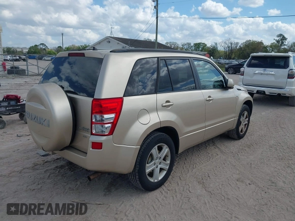 2008 Suzuki Grand Vitara Luxury z VIN JS3TD947384100130, wystawiony jako IAAI lot #41713955 z przebiegiem 180 631 mil mil oraz . Historia ofert i sprzedaży dostępna na DreamBid. Obrazek 4.