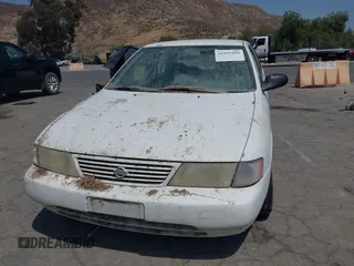 1996 Nissan Sentra XE z VIN 1N4AB41D3TC716326, wystawiony jako IAAI lot #42455181 z przebiegiem 235 076 mil mil oraz . Historia ofert i sprzedaży dostępna na DreamBid. Obrazek 6.