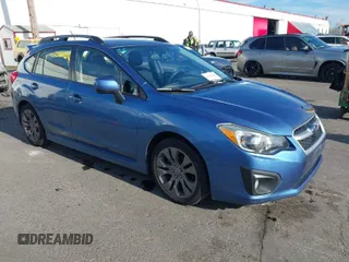 2014 Subaru Impreza Wagon 2.0i Sport Premium with VIN JF1GPAL61E8304789, listed as a IAAI auction lot 41412038 with 116,044 mi miles. Bid and sale history available at carsss.com. Image 1.
