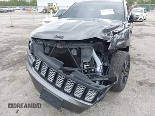 2018 Jeep Grand Cherokee Altitude z VIN 1C4RJEAG2JC428214, wystawiony jako IAAI lot #42661661 z przebiegiem 81 859 mil mil oraz . Historia ofert i sprzedaży dostępna na DreamBid. Obrazek 6.