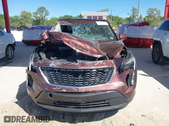 2022 Cadillac XT4 FWD Luxury with VIN 1GYAZAR42NF162880, listed as a IAAI auction lot 41850951 with 47,344 mi miles and . Bid and sale history available at carsss.com. Image 12.
