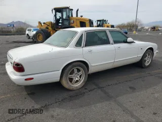 1999 Jaguar XJ with VIN SAJHX1048XC861105, listed as a Copart auction lot 50108225 with Not provided miles and Clean title. Bid and sale history available at DreamBid. Image 3.